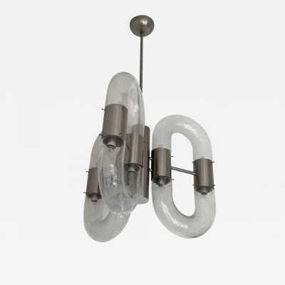 Mario Bellini, Harvey Guzzini, Luigi Massoni, Martinelli, Pierre Luster or Chain ring suspension in Murano glass and silver nickel-plated brass by Aldo Nason for Mazzega. Italy 1970. in the style of Venini, Veronese, La Murrina, Carlo Nason, Stilnovo, Joe Colombo, Arteluce, Arredoluce, Lumi, Luci, Rggiani, Sciolari, Werner Pantone, Luigi Colani, Raak, Angelo Lelii, Angelo Brotto, Esperia, Enrico Tronconi, Cardin, brass wall lamps mid-century modern space age chome metal