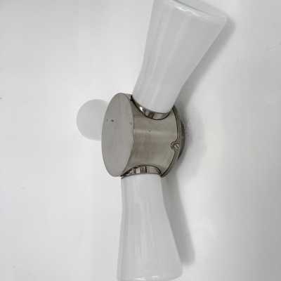 Pair of Helice glass and metal sconces. Italy 1990. in the style of Venini, La Murrina, Seguso, Carlo Aldo Nason, Poliarte, Esperia, Angelo Brotto, Stilnovo, Arteluce, Arredoluce, Artemide, Pierre Cardin, Lumi, Luci, Raak, Angelo Lelii, Francesco Bocola, Superstudio, Enrico Tronconi, Mario Bellini, Harvey Guzzini, Luigi Massoni, Martinelli, Fabio Lenci. lamps floor lamp chandelier suspension mid-century sconces