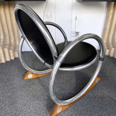 Dondolo rocking chairs in metal, leather and wood by Verner Panton for Ycami. Italy 1990. Created in 1994 by Danish designer. in the style of Gio Ponti, Gianfranco Frattini, Cassina, Osvaldo Borsani, Joe Colombo, Vico Magistretti, Luisa Parisi, Mario Bellini, Tito Agnoli, Afra Tobia Carlo Scarpa, Luciano Frigerio, Sporiti, Marco Zanuso, Giulio Moscatelli, Formanova. mid-century fireside chairs