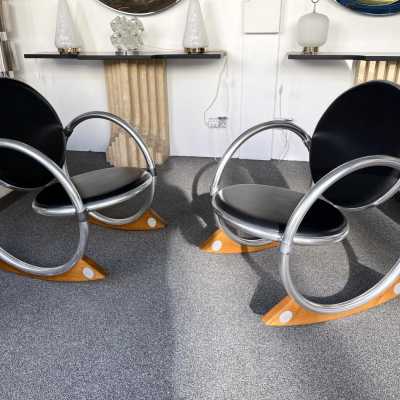 Dondolo rocking chairs in metal, leather and wood by Verner Panton for Ycami. Italy 1990. Created in 1994 by Danish designer. in the style of Gio Ponti, Gianfranco Frattini, Cassina, Osvaldo Borsani, Joe Colombo, Vico Magistretti, Luisa Parisi, Mario Bellini, Tito Agnoli, Afra Tobia Carlo Scarpa, Luciano Frigerio, Sporiti, Marco Zanuso, Giulio Moscatelli, Formanova. mid-century fireside chairs