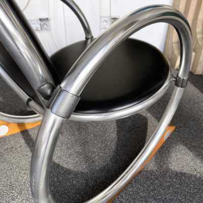 Dondolo rocking chairs in metal, leather and wood by Verner Panton for Ycami. Italy 1990. Created in 1994 by Danish designer. in the style of Gio Ponti, Gianfranco Frattini, Cassina, Osvaldo Borsani, Joe Colombo, Vico Magistretti, Luisa Parisi, Mario Bellini, Tito Agnoli, Afra Tobia Carlo Scarpa, Luciano Frigerio, Sporiti, Marco Zanuso, Giulio Moscatelli, Formanova. mid-century fireside chairs