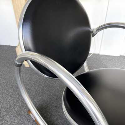 Dondolo rocking chairs in metal, leather and wood by Verner Panton for Ycami. Italy 1990. Created in 1994 by Danish designer. in the style of Gio Ponti, Gianfranco Frattini, Cassina, Osvaldo Borsani, Joe Colombo, Vico Magistretti, Luisa Parisi, Mario Bellini, Tito Agnoli, Afra Tobia Carlo Scarpa, Luciano Frigerio, Sporiti, Marco Zanuso, Giulio Moscatelli, Formanova. mid-century fireside chairs