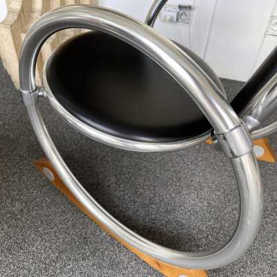 Dondolo rocking chairs in metal, leather and wood by Verner Panton for Ycami. Italy 1990. Created in 1994 by Danish designer. in the style of Gio Ponti, Gianfranco Frattini, Cassina, Osvaldo Borsani, Joe Colombo, Vico Magistretti, Luisa Parisi, Mario Bellini, Tito Agnoli, Afra Tobia Carlo Scarpa, Luciano Frigerio, Sporiti, Marco Zanuso, Giulio Moscatelli, Formanova. mid-century fireside chairs