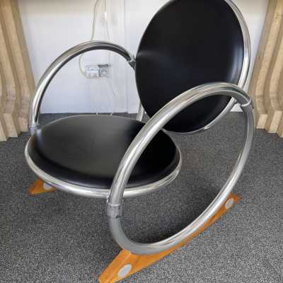 Dondolo rocking chairs in metal, leather and wood by Verner Panton for Ycami. Italy 1990. Created in 1994 by Danish designer. in the style of Gio Ponti, Gianfranco Frattini, Cassina, Osvaldo Borsani, Joe Colombo, Vico Magistretti, Luisa Parisi, Mario Bellini, Tito Agnoli, Afra Tobia Carlo Scarpa, Luciano Frigerio, Sporiti, Marco Zanuso, Giulio Moscatelli, Formanova. mid-century fireside chairs