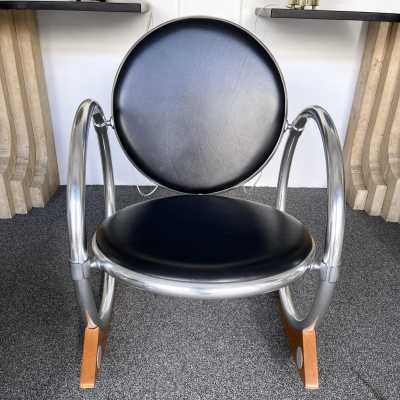 Dondolo rocking chairs in metal, leather and wood by Verner Panton for Ycami. Italy 1990. Created in 1994 by Danish designer. in the style of Gio Ponti, Gianfranco Frattini, Cassina, Osvaldo Borsani, Joe Colombo, Vico Magistretti, Luisa Parisi, Mario Bellini, Tito Agnoli, Afra Tobia Carlo Scarpa, Luciano Frigerio, Sporiti, Marco Zanuso, Giulio Moscatelli, Formanova. mid-century fireside chairs