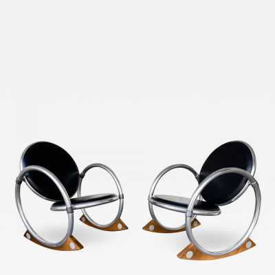 Dondolo rocking chairs in metal, leather and wood by Verner Panton for Ycami. Italy 1990. Created in 1994 by Danish designer. in the style of Gio Ponti, Gianfranco Frattini, Cassina, Osvaldo Borsani, Joe Colombo, Vico Magistretti, Luisa Parisi, Mario Bellini, Tito Agnoli, Afra Tobia Carlo Scarpa, Luciano Frigerio, Sporiti, Marco Zanuso, Giulio Moscatelli, Formanova. mid-century fireside chairs