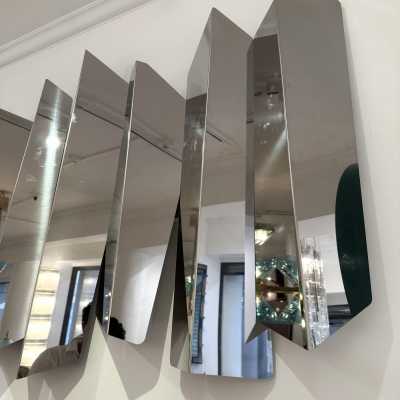 Large polished stainless steel metal wall lamp by Mario Torregiani. Italy 1990. in the style of Aldo Nason, Poliarte, Esperia, Angelo Brotto, Stilnovo, Arteluce, Arredoluce, Artemide, Pierre Cardin, Lumi, Luci, Raak, Angelo Lelii, Francesco Bocola, Superstudio, Enrico Tronconi, Mario Bellini, Harvey Guzzini , Luigi Massoni, Martinelli, Fabio Lenci, Gio Ponti, Sciolari, Willy Rizzo, Reggiani. lamp wall lightning chandelier sconces chrome stainless steel brass mid-century modern space age italy 1970 1980