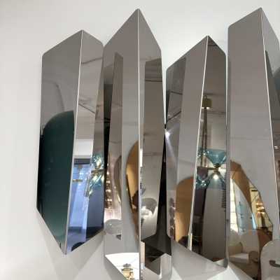 Large polished stainless steel metal wall lamp by Mario Torregiani. Italy 1990. in the style of Aldo Nason, Poliarte, Esperia, Angelo Brotto, Stilnovo, Arteluce, Arredoluce, Artemide, Pierre Cardin, Lumi, Luci, Raak, Angelo Lelii, Francesco Bocola, Superstudio, Enrico Tronconi, Mario Bellini, Harvey Guzzini , Luigi Massoni, Martinelli, Fabio Lenci, Gio Ponti, Sciolari, Willy Rizzo, Reggiani. lamp wall lightning chandelier sconces chrome stainless steel brass mid-century modern space age italy 1970 1980