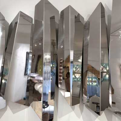 Large polished stainless steel metal wall lamp by Mario Torregiani. Italy 1990. in the style of Aldo Nason, Poliarte, Esperia, Angelo Brotto, Stilnovo, Arteluce, Arredoluce, Artemide, Pierre Cardin, Lumi, Luci, Raak, Angelo Lelii, Francesco Bocola, Superstudio, Enrico Tronconi, Mario Bellini, Harvey Guzzini , Luigi Massoni, Martinelli, Fabio Lenci, Gio Ponti, Sciolari, Willy Rizzo, Reggiani. lamp wall lightning chandelier sconces chrome stainless steel brass mid-century modern space age italy 1970 1980