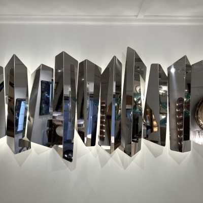 Large polished stainless steel metal wall lamp by Mario Torregiani. Italy 1990. in the style of Aldo Nason, Poliarte, Esperia, Angelo Brotto, Stilnovo, Arteluce, Arredoluce, Artemide, Pierre Cardin, Lumi, Luci, Raak, Angelo Lelii, Francesco Bocola, Superstudio, Enrico Tronconi, Mario Bellini, Harvey Guzzini , Luigi Massoni, Martinelli, Fabio Lenci, Gio Ponti, Sciolari, Willy Rizzo, Reggiani. lamp wall lightning chandelier sconces chrome stainless steel brass mid-century modern space age italy 1970 1980
