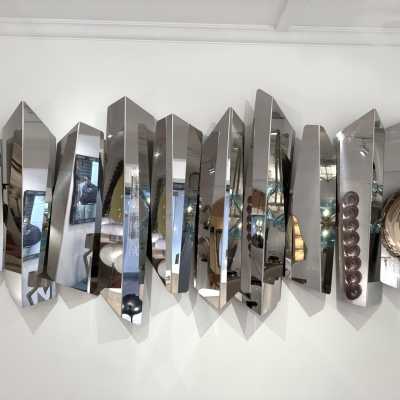 Large polished stainless steel metal wall lamp by Mario Torregiani. Italy 1990. in the style of Aldo Nason, Poliarte, Esperia, Angelo Brotto, Stilnovo, Arteluce, Arredoluce, Artemide, Pierre Cardin, Lumi, Luci, Raak, Angelo Lelii, Francesco Bocola, Superstudio, Enrico Tronconi, Mario Bellini, Harvey Guzzini , Luigi Massoni, Martinelli, Fabio Lenci, Gio Ponti, Sciolari, Willy Rizzo, Reggiani. lamp wall lightning chandelier sconces chrome stainless steel brass mid-century modern space age italy 1970 1980