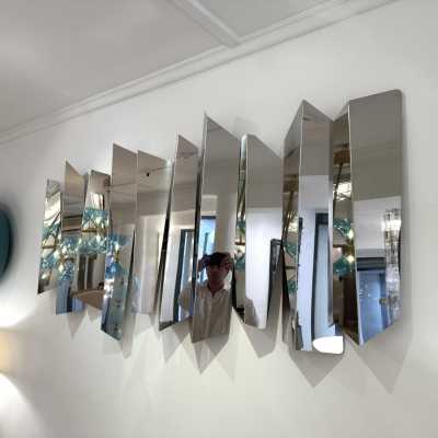 Large polished stainless steel metal wall lamp by Mario Torregiani. Italy 1990. in the style of Aldo Nason, Poliarte, Esperia, Angelo Brotto, Stilnovo, Arteluce, Arredoluce, Artemide, Pierre Cardin, Lumi, Luci, Raak, Angelo Lelii, Francesco Bocola, Superstudio, Enrico Tronconi, Mario Bellini, Harvey Guzzini , Luigi Massoni, Martinelli, Fabio Lenci, Gio Ponti, Sciolari, Willy Rizzo, Reggiani. lamp wall lightning chandelier sconces chrome stainless steel brass mid-century modern space age italy 1970 1980
