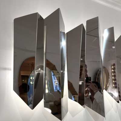 Large polished stainless steel metal wall lamp by Mario Torregiani. Italy 1990. in the style of Aldo Nason, Poliarte, Esperia, Angelo Brotto, Stilnovo, Arteluce, Arredoluce, Artemide, Pierre Cardin, Lumi, Luci, Raak, Angelo Lelii, Francesco Bocola, Superstudio, Enrico Tronconi, Mario Bellini, Harvey Guzzini , Luigi Massoni, Martinelli, Fabio Lenci, Gio Ponti, Sciolari, Willy Rizzo, Reggiani. lamp wall lightning chandelier sconces chrome stainless steel brass mid-century modern space age italy 1970 1980