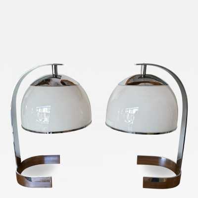 Pair of lamps in chromed metal and Murano glass. Italy 1970. design attributed to Reggiani. in the style of Venini, Vistosi, La Murrina, Seguso, Carlo Nason, Poliarte, Esperia, Angelo Brotto, Stilnovo, Arteluce, Arredoluce, Artemide, Pierre Cardin, Lumi, Luci, Raak, Angelo Lelii, Francesco Bocola, Superstudio, Enrico Tronconi , Mario Bellini, Harvey Guzzini, Luigi Massoni, Martinelli, Fabio Lenci, Gio Ponti floor lamp chandelier pendant lightning brass stainless steel mid-century modern space age italy