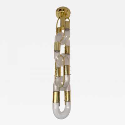 Chandelier or chain suspension in Murano glass and brass by Aldo Nason for Mazzega. Italy 1970s. in the style of Venini, Vistosi, La Murrina, Seguso, Carlo Nason, Poliarte, Esperia, Angelo Brotto, Stilnovo, Arteluce, Arredoluce, Artemide, Pierre Cardin, Lumi, Luci, Raak, Angelo Lelii, Francesco Bocola, Superstudio, Enrico Tronconi , Mario Bellini, Harvey Guzzini, Luigi Massoni, Martinelli, Fabio Lenci, Gio Ponti. metal stainless steel mid-century modern space pendant lightning floor lamp light