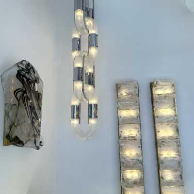 Chandelier suspension pendant lightning chain in Murano glass and chromed metal by Aldo Nason for Mazzega. Italy 1970s. in the style of Venini, Vistosi, La Murrina, Seguso, Carlo Nason, Poliarte, Esperia, Angelo Brotto, Stilnovo, Arteluce, Arredoluce, Artemide, Pierre Cardin, Lumi, Luci, Raak, Angelo Lelii, Francesco Bocola, Superstudio, Enrico Tronconi , Mario Bellini, Harvey Guzzini, Luigi Massoni, Martinelli, Fabio Lenci, Gio Ponti. brass stainless steel mid-century modern space age lamps sconces