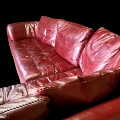 Red leather corner sofa