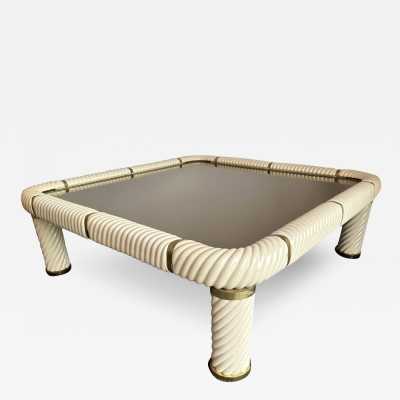 Ceramic or porcelain and brass coffee table, bronze-tinted glass top by Tommaso Barbi. Italy 1970. in the style of Frigerio, Sandro Petti, Jansen, Hollywood Regency, Romeo Rega, Mangiarotti, Willy Rizzo. side tables console metal stainless steel chrome mid-century modern hollywood regency