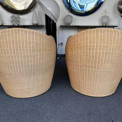 Mid-Century Modern style pair of King Tubby rattan wicker armchairs or lounge chairs by the designer Platt and Young for the quality and famous Italian design editor Driade from the 1990s, (1998). Famous design like Gio Ponti, Gianfranco Frattini, Cassina, Osvaldo Borsani, Joe Colombo, Vico Magistretti, Luisa Parisi, Mario Bellini, Tito Agnoli, Afra Tobia Carlo Scarpa, Luciano Frigerio, Sporiti, Marco Zanuso, Giulio Moscatelli, Formanova, Maxalto, Alvar Aalto. mid-century modern space age hollywood regency