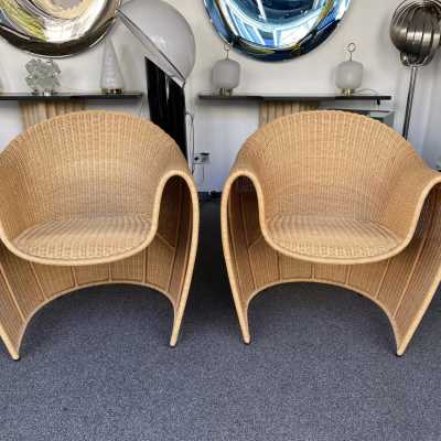 Mid-Century Modern style pair of King Tubby rattan wicker armchairs or lounge chairs by the designer Platt and Young for the quality and famous Italian design editor Driade from the 1990s, (1998). Famous design like Gio Ponti, Gianfranco Frattini, Cassina, Osvaldo Borsani, Joe Colombo, Vico Magistretti, Luisa Parisi, Mario Bellini, Tito Agnoli, Afra Tobia Carlo Scarpa, Luciano Frigerio, Sporiti, Marco Zanuso, Giulio Moscatelli, Formanova, Maxalto, Alvar Aalto. mid-century modern space age hollywood regency