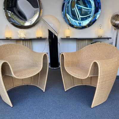 Mid-Century Modern style pair of King Tubby rattan wicker armchairs or lounge chairs by the designer Platt and Young for the quality and famous Italian design editor Driade from the 1990s, (1998). Famous design like Gio Ponti, Gianfranco Frattini, Cassina, Osvaldo Borsani, Joe Colombo, Vico Magistretti, Luisa Parisi, Mario Bellini, Tito Agnoli, Afra Tobia Carlo Scarpa, Luciano Frigerio, Sporiti, Marco Zanuso, Giulio Moscatelli, Formanova, Maxalto, Alvar Aalto. mid-century modern space age hollywood regency