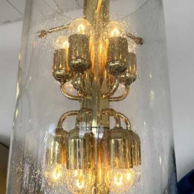 Mid-Century Modern Chandelier ceiling pendant light lightning fixture brass and bubble glass tube. Probably a German manufacturing for the Italian market during the 70s. In the mood of Venini, Vistosi, La Murrina, Seguso, Aldo Nason, Poliarte, Esperia, Angelo Brotto, Stilnovo, Arteluce, Arredoluce, Artemide, Pierre Cardin, Lumi, Luci, Raak, Angelo Lelii, Francesco Bocola, Superstudio, Enrico Tronconi , Mario Bellini, Harvey Guzzini, Luigi Massoni, Martinelli, Fabio Lenci, Gio Ponti, Reggiani, space age
