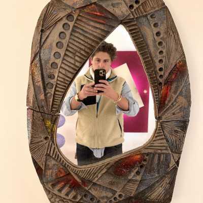 ceramic terracotta lava stone enameled sculpture wall mirror. In the mood of Claudio Pulli, Roger Capron, Borderie, Les Frères Cloutier, Mado Jolain, Les 2 Potiers, Georges Jouves, Ruelland, Les Argonautes. mid-century modern brutalist brass metal wood 1970s 1950s 1980s