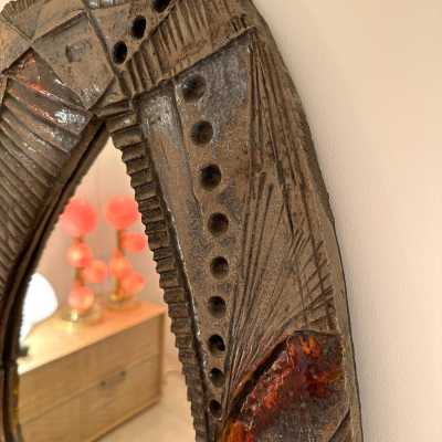 ceramic terracotta lava stone enameled sculpture wall mirror. In the mood of Claudio Pulli, Roger Capron, Borderie, Les Frères Cloutier, Mado Jolain, Les 2 Potiers, Georges Jouves, Ruelland, Les Argonautes. mid-century modern brutalist brass metal wood 1970s 1950s 1980s