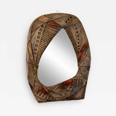 ceramic terracotta lava stone enameled sculpture wall mirror. In the mood of Claudio Pulli, Roger Capron, Borderie, Les Frères Cloutier, Mado Jolain, Les 2 Potiers, Georges Jouves, Ruelland, Les Argonautes. mid-century modern brutalist brass metal wood 1970s 1950s 1980s