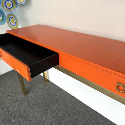 Mid-Century Modern Space Age Hollywood Regency orange lacquered console table with wood interior, 2 drawers, brass feet and handle by the French designer Guy Lefevre. Famous manufacture like Maison Jansen, Mahey, Mario Sabot, Charles. wood metal 1960s 1950s console table end side low coffee cocktail