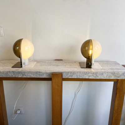 Mid-Century Modern Space Age pair of lucite plastic methacrylate table or bedside lamps, model Sirio by the Italian designer Brazzoni and Lampa for the editor Harvey Guzzini. Famous design like Reggiani, Sciolari, Francesco Buzzi Ceriani, Stilnovo, Angelo Brotto for Esperia, Aldo Carlo Nason for Mazzega, Venini, Vistosi, La Murrina, Toni Zuccheri, Fontana Arte, Artemide, Arteluce, Arredoluce, Luigi Caccia Dominioni. 1950s 1960s 1980s metal brass wood