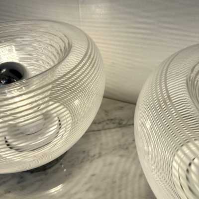 Pair of table or bedside lamps in metal chrome, white and clear stripe blown Murano glass by the Italian designer editor VeArt. Famous design like Mazzega, Venini, Vistosi, Veronese, La Murrina, Aldo Carlo Nason, Stilnovo, Joe Colombo, Arteluce, Arredoluce, Lumi, Luci, Rggiani, Sciolari, Werner Pantone, Raak, Angelo Brotto, Esperia, Francesco Bocola, Enrico Tronconi , Mario Bellini, Harvey Guzzini, Luigi Massoni, Martinelli, Pierre Cardin,. Mid-Century modern space age brass wood 1960s 1950s 1980s