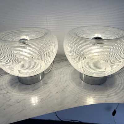 Pair of table or bedside lamps in metal chrome, white and clear stripe blown Murano glass by the Italian designer editor VeArt. Famous design like Mazzega, Venini, Vistosi, Veronese, La Murrina, Aldo Carlo Nason, Stilnovo, Joe Colombo, Arteluce, Arredoluce, Lumi, Luci, Rggiani, Sciolari, Werner Pantone, Raak, Angelo Brotto, Esperia, Francesco Bocola, Enrico Tronconi , Mario Bellini, Harvey Guzzini, Luigi Massoni, Martinelli, Pierre Cardin,. Mid-Century modern space age brass wood 1960s 1950s 1980s