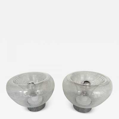 Pair of table or bedside lamps in metal chrome, white and clear stripe blown Murano glass by the Italian designer editor VeArt. Famous design like Mazzega, Venini, Vistosi, Veronese, La Murrina, Aldo Carlo Nason, Stilnovo, Joe Colombo, Arteluce, Arredoluce, Lumi, Luci, Rggiani, Sciolari, Werner Pantone, Raak, Angelo Brotto, Esperia, Francesco Bocola, Enrico Tronconi , Mario Bellini, Harvey Guzzini, Luigi Massoni, Martinelli, Pierre Cardin,. Mid-Century modern space age brass wood 1960s 1950s 1980s