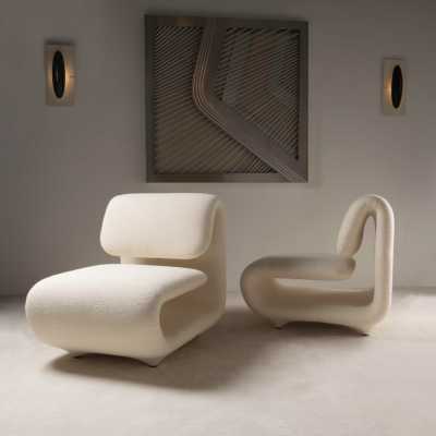 Pair of low chairs by Etienne Henri Martin in 1960