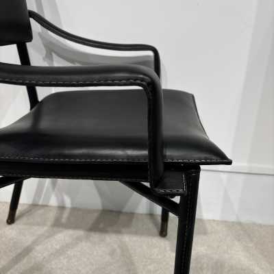 Pair of Jacques Adnet armchairs