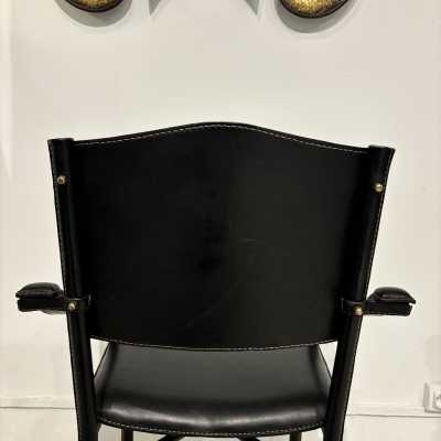 Pair of Jacques Adnet armchairs