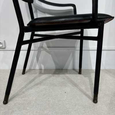 Pair of Jacques Adnet armchairs