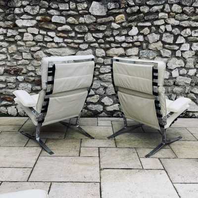Chrome metal armchairs