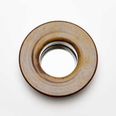 Brown glazed ceramic mirror by Mia Jensen.