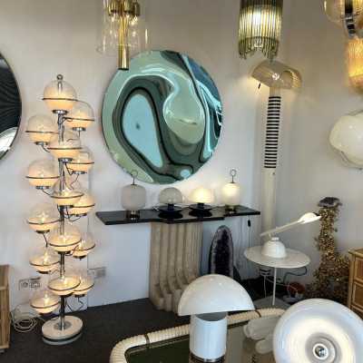 Rare, tall, Space Age-style floor lamp from the Italian manufacturer Candle, made of chrome-plated metal and white smoked glass globes. Renowned manufacturers include Fontana Arte, Sarfatti, Artemide, Arredoluce, Sciolari, Reggiani, Arlus, Stilnovo, Angelo Lelii Esperia, and Hollywood Regency.