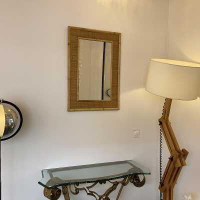 Hollywood Regency style wall mirror, Mid-Century Modern style, beautiful blend of bamboo, rattan and raffia, made by the Dal Vera manufacturer. Famous designers include Renato Zevi, Romeo Rega, Maison Jansen, Willy Rizzo and Mario Sabot.