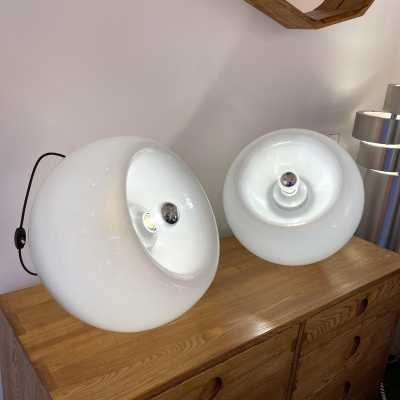 Pair of Space Age style Vacuna table, bedside or floor lamps in smoked white blown Murano glass, created by the Italian designer Eleanore Peduzzi-Riva for Artemide, late 1960s, produced in 1968 and produced in the 1970s. Double-position concave glass. Renowned manufacturers: Venini, Veronese, La Murrina, Aldo Carlo Nason for Mazzega, Stilnovo, Joe Colombo, Arteluce, Arredoluce, Lumi, Luci, Rggiani, Sciolari, Werner Pantone, Luigi Colani, Raak, Angelo Lelii, Angelo