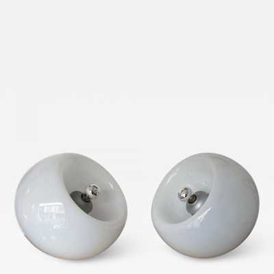 Pair of Space Age style Vacuna table, bedside or floor lamps in smoked white blown Murano glass, created by the Italian designer Eleanore Peduzzi-Riva for Artemide, late 1960s, produced in 1968 and produced in the 1970s. Double-position concave glass. Renowned manufacturers: Venini, Veronese, La Murrina, Aldo Carlo Nason for Mazzega, Stilnovo, Joe Colombo, Arteluce, Arredoluce, Lumi, Luci, Rggiani, Sciolari, Werner Pantone, Luigi Colani, Raak, Angelo Lelii, Angelo