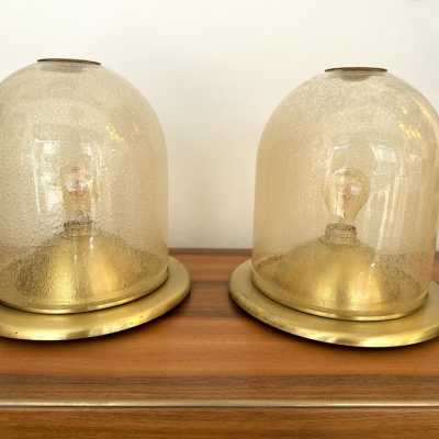 Pair of Space Age style table or bedside lamps in brass and gilded bubbled Murano glass by F. Fabbian. Famous designs by: Carlo Aldo Nason for Mazzega, Venini, Vistosi, La Murrina, Poliarte, Stilnovo, Arteluce, Arredoluce, Angelo Brotto for Esperia, Fontana Arte and Cristal Art.