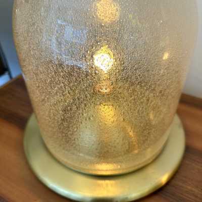 Pair of Space Age style table or bedside lamps in brass and gilded bubbled Murano glass by F. Fabbian. Famous designs by: Carlo Aldo Nason for Mazzega, Venini, Vistosi, La Murrina, Poliarte, Stilnovo, Arteluce, Arredoluce, Angelo Brotto for Esperia, Fontana Arte and Cristal Art.