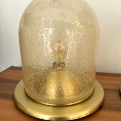 Pair of Space Age style table or bedside lamps in brass and gilded bubbled Murano glass by F. Fabbian. Famous designs by: Carlo Aldo Nason for Mazzega, Venini, Vistosi, La Murrina, Poliarte, Stilnovo, Arteluce, Arredoluce, Angelo Brotto for Esperia, Fontana Arte and Cristal Art.