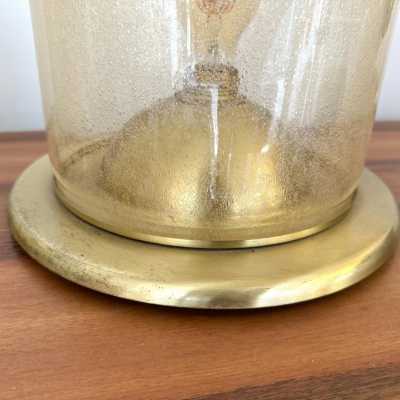 Pair of Space Age style table or bedside lamps in brass and gilded bubbled Murano glass by F. Fabbian. Famous designs by: Carlo Aldo Nason for Mazzega, Venini, Vistosi, La Murrina, Poliarte, Stilnovo, Arteluce, Arredoluce, Angelo Brotto for Esperia, Fontana Arte and Cristal Art.