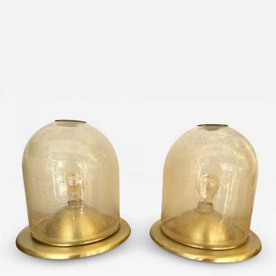 Pair of Space Age style table or bedside lamps in brass and gilded bubbled Murano glass by F. Fabbian. Famous designs by: Carlo Aldo Nason for Mazzega, Venini, Vistosi, La Murrina, Poliarte, Stilnovo, Arteluce, Arredoluce, Angelo Brotto for Esperia, Fontana Arte and Cristal Art.