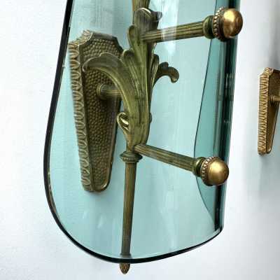 Mid-century modernist wall sconces, glass and gilded bronze lighting sconces. In the atmosphere of Pietro Chiesa for the Italian design factory Fontana Arte. Famous designs like Reggiani, Sciolari, Francesco Buzzi Ceriani, Angelo Brotto for Esperia, Aldo Carlo Nason for Mazzega, Venini, Vistosi, La Murrina, Toni Zuccheri, Fontana Arte, Artemide, Arteluce, Arredoluce, Luigi Caccia Dominioni, Stilnovo.
